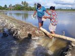 Jalan Putus Akibat Banjir, 15 KK di Dusun Gitgit Sari Balinggi Terisolir