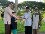 Pj Bupati Parigi Moutong Serahkan 12 Ekor Hewan Kurban