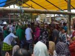 Sambut Musim Panen Padi, Petani diDesa Kasimbar Palapi Gelar Mappadendang