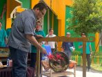 Pemda Parimo Salurkan Bantuan dan Launching Kios Pangan