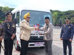 HUT Ke 23 Parimo ,Pemdes Kotaraya Terima Bantuan 1 unit Bus Sekolah