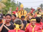 Lembaga Adat Tialo Anugerahkan Gelar Kehormatan kepada Bupati dan Wabup Parimo