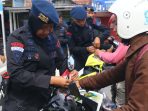 Brimob Sulteng Bagikan 1000 Bendera Sambut HUT ke-80 RI
