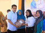 Bupati Parimo Serahkan Sertifikat Halal dan Resmikan Koperasi Merah Putih di Palasa